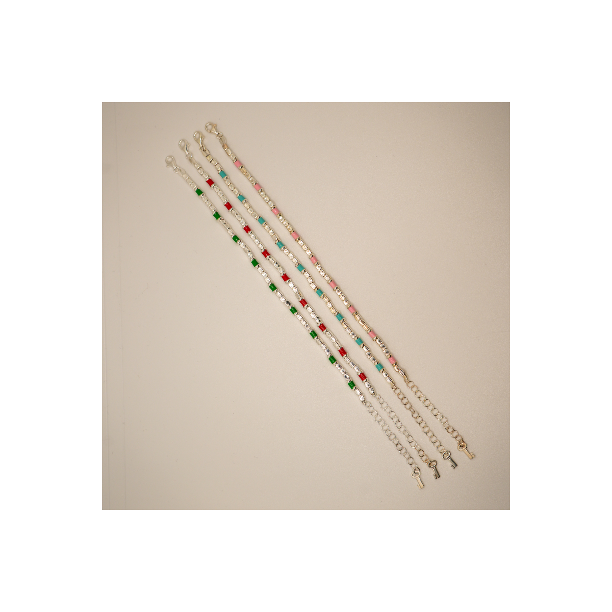 Polseres de plata amb esmalt de colors